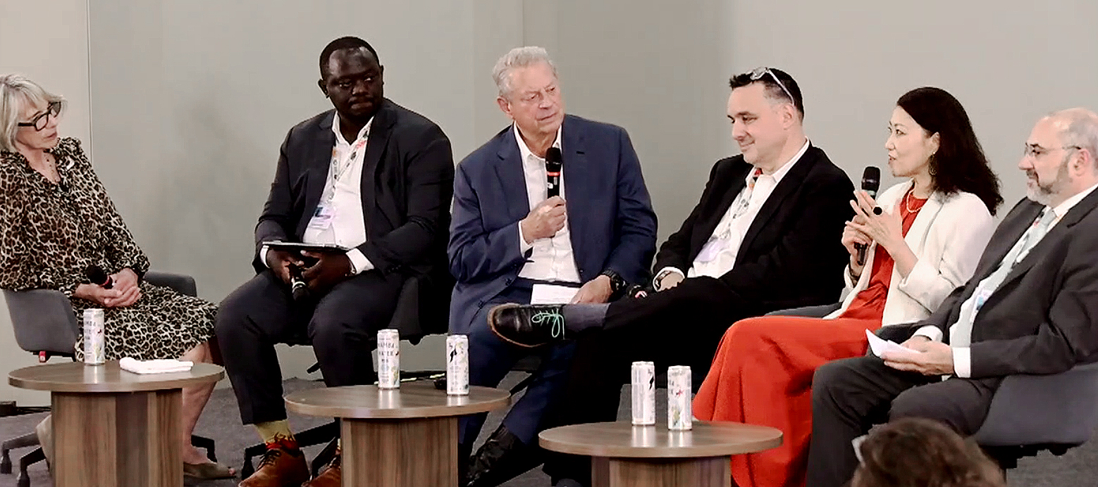 Linda-Eling Lee, the MSCI Institute’s founding director (second from right), discusses the use of data-driven analytics in climate investing with, left to right, Jane Lomax, lord mayor of Adelaide, Australia; David Gonahasa, an economist with Uganda’s Ministry of Science, Technology and Innovation; Al Gore, the former U.S. vice president and a co-founder of Climate TRACE; Andrew Zolli, chief impact officer, Planet Labs; and James Grabert, mitigation director, UNFCCC.